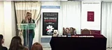 Teresa-and-the-TLIG-Book-Display.png